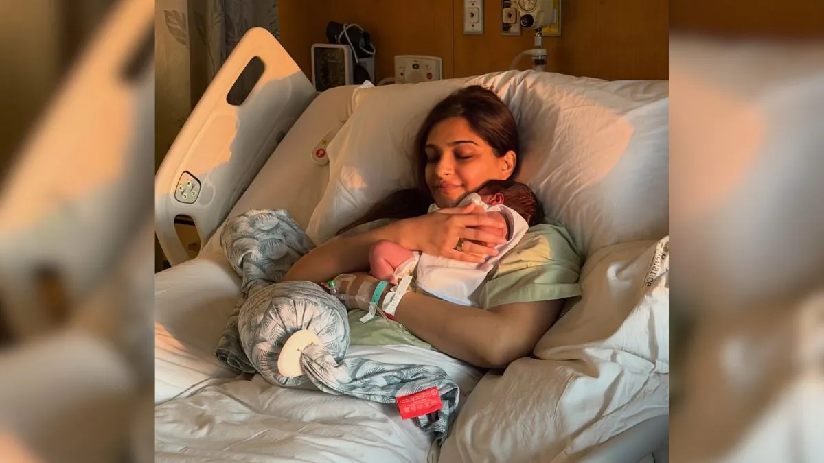 Sonam Kapoor holds her new baby close and shares the first picture from the hospital. She says, "Grateful beyond words."