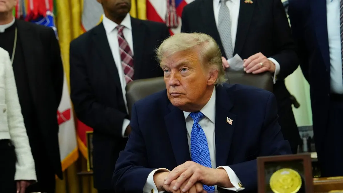 Trump warns he will act against Lisa Cook after Supreme Court blocks attempt to fire Fed Governor